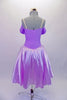 Beautiful lavender romantic ballet dress has a calf-length satin circle skirt over layers of tulle. The bodice is a lavender camisole with elastic straps and cold-shoulder style sleeves. The bust is adorned with a large 3-D gold floral applique that really makes a statement. Comes with a gold applique hair accessory. Back