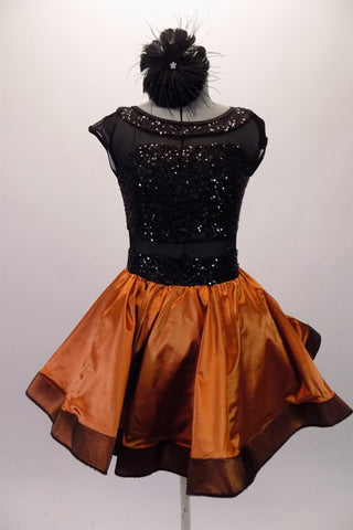 Dress has a copper satin circle skirt with an attached petticoat for volume & black mesh stiffer edge for shape. The bodice is black sequined at waist bustline & boatneck accent. The base of the bodice is black mesh to create the two-tone effect. The back snaps from neck to mid-back. Comes with matching hair accessory. Front