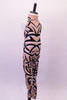 High collar, full unitard with open back is covered with a series of geometric design resembling war paint in shades of black and white on a nude base. Side