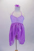 Lilac 2-piece costume is comprised of a delicate lace bust halter neck dress with crystal accents at banding and bust. The soft chiffon double layer skirt is split down the front centre to reveal the matching lilac shorts with a lace waistband. Comes with a lilac floral hair accessory. Fronr