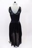 Black high-low layered chiffon dress has lace upper bodice and side inserts. Back is lace and lycra for additional stretch. Comes with floral hair accessory. Back