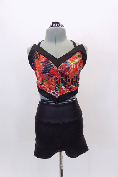 Red graffiti, brick patterned, halter half-top, has corset back & matching quilted, leather-like, high-waisted shorts. Comes with matching crystal hair piece. Front