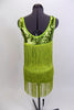 Avocado Green fringe flapper style dress has sequined bodice & matching headband with large ostrich feather. The outfit comes with matching fringed go-go boots. Back