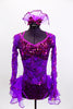 Bright purple lace & sequined, long sleeved leotard has open mid-back & layered organza back bustle with sequined edge. Comes with matching hair accessory. Front