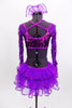 Bright purple lace & sequined, long sleeved leotard has open mid-back & layered organza back bustle with sequined edge. Comes with matching hair accessory. Back