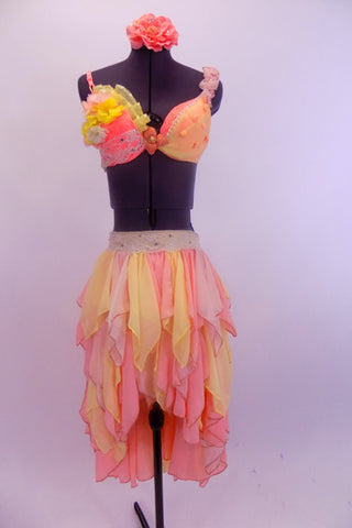 Peach lace bra with chiffon roses, pearls,crystals & lace has matching pale yellow brief  with peach accents & peach/yellow chiffon skirt with layers of chiffon kerchiefs. Has matching floral hair accessory. Front