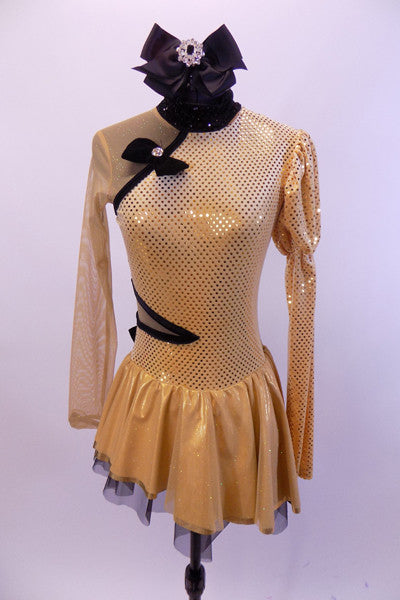 Gold long sleeved dress had one pouf & one sheer gold mesh sleeve & shoulder. Oriental style collar & piping. Has large black bow on back & black hair bow. Front
