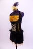 Halter style leotard dress has gold sequined bust area with ruffle. Bodice is corset style & black skirt has gold bead fringe. Comes with feather hair accessory. Side