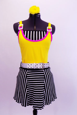 Three piece costume yellow leotard with pink piping and white shoulder buckles. The skirt is black and white striped alternating panels with a white belt and matching striped  bandeau top.  Comes with bright yellow hair accessory. Front