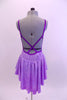 Pale lavender marble  leotard dress has purple glitter front bodice and low open back with cross straps.  A purple glitter swirled applique accent surrounds the glittery bodice. Comes with matching hair accessory. Back