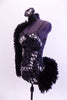 Leotard with silver mosaic butterfly pattern and black leather trim. Right arm, shoulder and left hip accent are black curly fur, Has matching hair accessory. Side