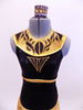 Black and gold leather-like leotard dress has custom painted Egyptian markings on skirt, bodice and large gold Egyptian pharaoh collar. Has an open lower back and cascade on back of skirt. Comes with gold hair accessory. Front Zoom