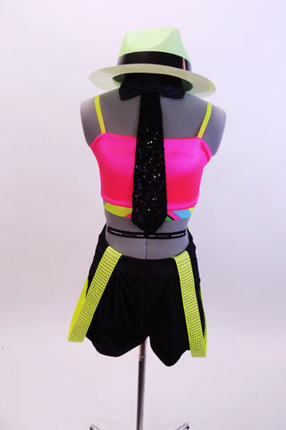 Bright neon pink half top comes with black shorts, sequined black tie/collar accessory, bright yellow hanging suspenders and a neon green hat. Front
