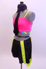 Bright neon pink half top comes with black shorts, sequined black tie/collar accessory, bright yellow hanging suspenders and a neon green hat. Side