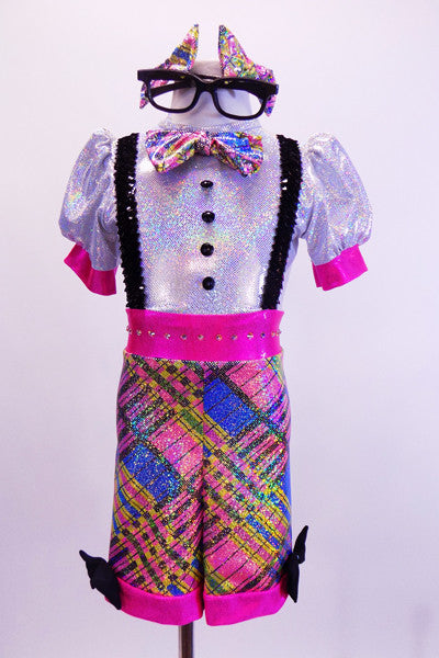 Brightly coloured iridescent tartan short unitard with crystal accented waistband has attached sequined suspenders, buttons and bow tie. Comes with large geek glasses, and bow hair accessories.   Front