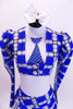 Three piece costume comes with white halter leotard with painted tie, blue-white-black tartan pleated skirt and pouf-sleeved blazer. Comes with white hair bow. Front zoomed