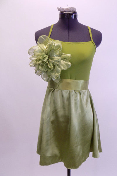  Olive coloured camisole leotard dress has satin skirt and satin sash. There is a large soft organza flower on the upper right side of the bodice. Very simple, and soft. Comes with crystal barrette hair accessory. Front