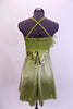  Olive coloured camisole leotard dress has satin skirt and satin sash. There is a large soft organza flower on the upper right side of the bodice. Very simple, and soft. Comes with crystal barrette hair accessory. Back