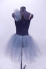 Grey cross over leotard dress has crystals on the left bust & long tulle skirt. There is a large drop crystal accent at the front. Comes with hair accessory. Back