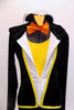 Black 3 piece costume has leotard with padded tummy & yellow front bib. Comes with black velvet harem  pants,silver hooded tailcoat with beak & orange bow-tie. Front zoomed