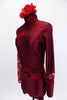 Deep red short unitard has high collar and long sleeves. The entire back and right sleeve is comprised of floral lace with matching insert lace panels at left shoulder, left hip and left wrist. Comes with deep red matching rose hair accessory. Side