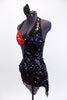 Red velvet halter bra and matching brief has inlaid gold swirl patterns and a black sequin covered shawl-like half-dress that originates from the left shoulder, wrapping around bust to the right hip. The open back has three nude coloured straps to hold the bra in place. (32A). Comes with matching hair accessory. Left Side