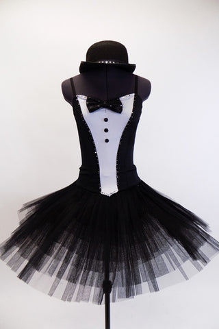  pleated, tacked tutu with ruffled panty. The Costume is completed with a black bowler hat with crystal accents. Front