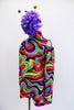 Short unitard with high neck, open shoulders & keyhole back has kaleidoscope of bright colour swirls. 1960’s inspired look. Comes with large  hair accessory. Side