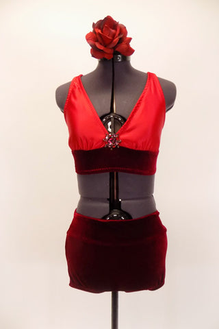 Red, halter bra top has triangle bust with broach accent, deep red velvet  band and matching red velvet shorts (can be decorated).  Great for contemporary piece. Comes with red floral hair accessory. (NEW)  Front