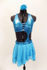 Aqua sequined bra top has triple strap front closure & criss-cross back. Matching skirt has layers of crystaled chiffon. Comes with floral hair accessory. Front