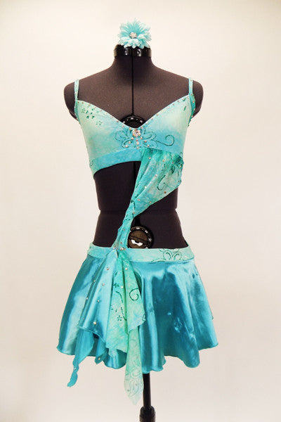 Pale aqua floral bra with crystals & four back straps, is attached to satin skirt with matching floral draping across front torso. Comes with aqua hair accessory. Front