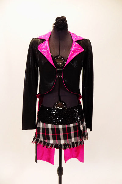 Black tailcoat has shimmery hot pink ling crystal covered lapels. It is secured in the front bay two crystal covered straps. The skirt is a pink-black and white tartan print with wide sequin belt. Comes with matching hair accessory. Front