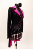 Black tailcoat has shimmery hot pink ling crystal covered lapels. It is secured in the front bay two crystal covered straps. The skirt is a pink-black and white tartan print with wide sequin belt. Comes with matching hair accessory. Right side