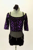 Leotard has purple sequined upper bodice and sheer black mesh torso & matching black shorts with crystal accents . Comes with matching hair accessory. Front