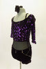 Leotard has purple sequined upper bodice and sheer black mesh torso & matching black shorts with crystal accents . Comes with matching hair accessory. Side