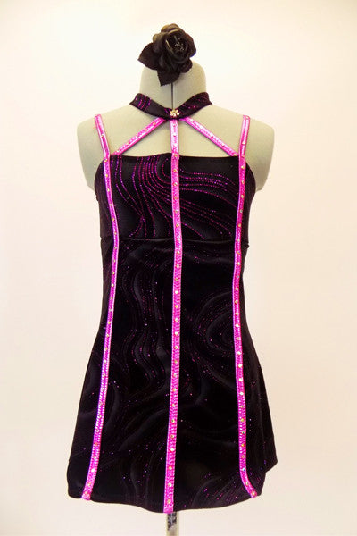 Black swirl velvet, A-line baby-doll dress has attached panty, and crystal lined vertical pink accents. The pink stripe accents come together at the velvet choker collar. Comes with hair accessory. Front