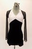 Black velvet short unitard has white halter sequined bust and a separate sheer black sparkle mini shrug. Comes with matching hair accessory. Front
