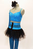 Turquoise and black striped leggings with crystal accents comes with black tutu skirt that has a matching stripped corset style waistband. There is also a turquoise half bra top and long arm gauntlet. Right side