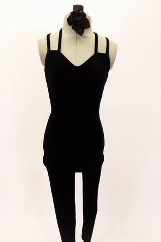 Black velvet full unitard has low back with double criss-cross straps. Comes with black floral hair accessory. Front