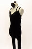Black velvet full unitard has low back with double criss-cross straps. Comes with black floral hair accessory. Side
