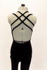 Black velvet full unitard has low back with double criss-cross straps. Comes with black floral hair accessory. Back