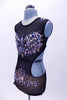 Black mesh leotard with open sides and back is lined with nude lycra in brief area. The costume is extensively covered with jewels, Swarovski crystals and metal studs along the bodice and hips.  Comes with metallic jewel hair accessory. Left side