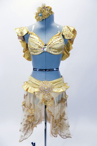 Gold satin pleated bra top has sequined ruffle along shoulders and black. The skirt is sheer sequined-beaded gold lace that opens at the front and has a wide satin gathered waist band with peplum ruffle. The crowning touch is the very large Swarovski crystal covered belt accent. Costume comes with matching gold sequined hair accessory. Front
