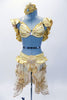 Gold satin pleated bra top has sequined ruffle along shoulders and black. The skirt is sheer sequined-beaded gold lace that opens at the front and has a wide satin gathered waist band with peplum ruffle. The crowning touch is the very large Swarovski crystal covered belt accent. Costume comes with matching gold sequined hair accessory. Front