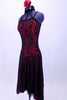 Spanish flare red and black lace dress has long flowing circle skirt bottom attached to camisole style top with velvet crystaled strap accent that join to black choker collar. Comes with floral hair accessory. Left side
