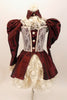 Deep burgundy 3 piece taffeta &cream lace Elizabethan style costume has pouf-sleeves with lace cuffs, ruffled lace skirt with taffeta overlay & high lace neck with collar accessory with front panel and buttons. Front