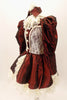 Deep burgundy 3 piece taffeta &cream lace Elizabethan style costume has pouf-sleeves with lace cuffs, ruffled lace skirt with taffeta overlay & high lace neck with collar accessory with front panel and buttons. Left side