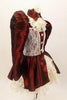 Deep burgundy 3 piece taffeta &cream lace Elizabethan style costume has pouf-sleeves with lace cuffs, ruffled lace skirt with taffeta overlay & high lace neck with collar accessory with front panel and buttons. Right side