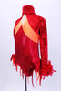 Red iridescent leotard has crushed velvet upper with orange stripe extending to open back with orange & red flame bustle. Sleeves & hat  have red feathers. Side