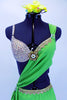 Apple green sarong dress over nude bra (34B) covered in Swarovski crystals has gold lace edging & large golden broach. Comes with green orchid hair accessory. Front zoomed